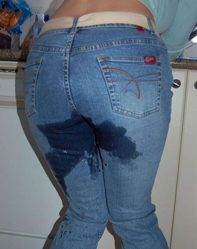 Peeing tight blue jeans