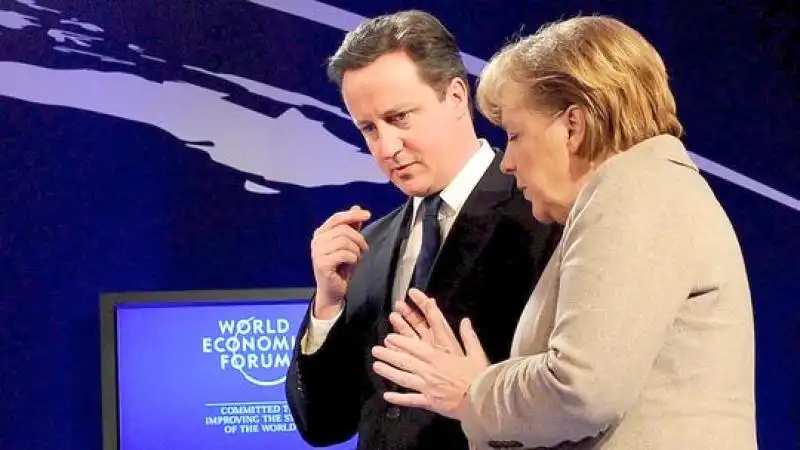 CAMERON E MERKEL A DAVOS 