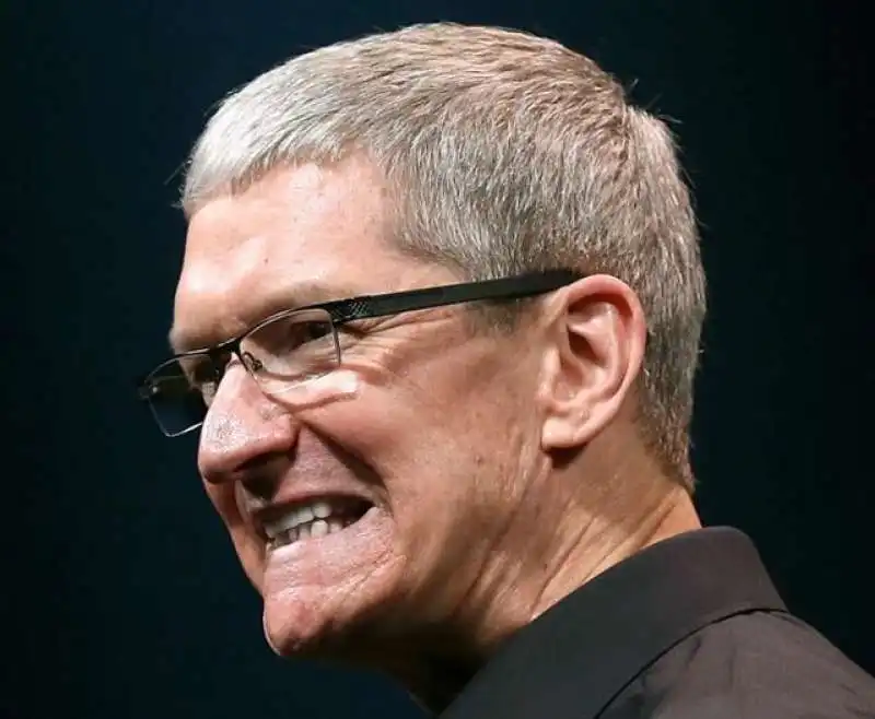 TIM COOK