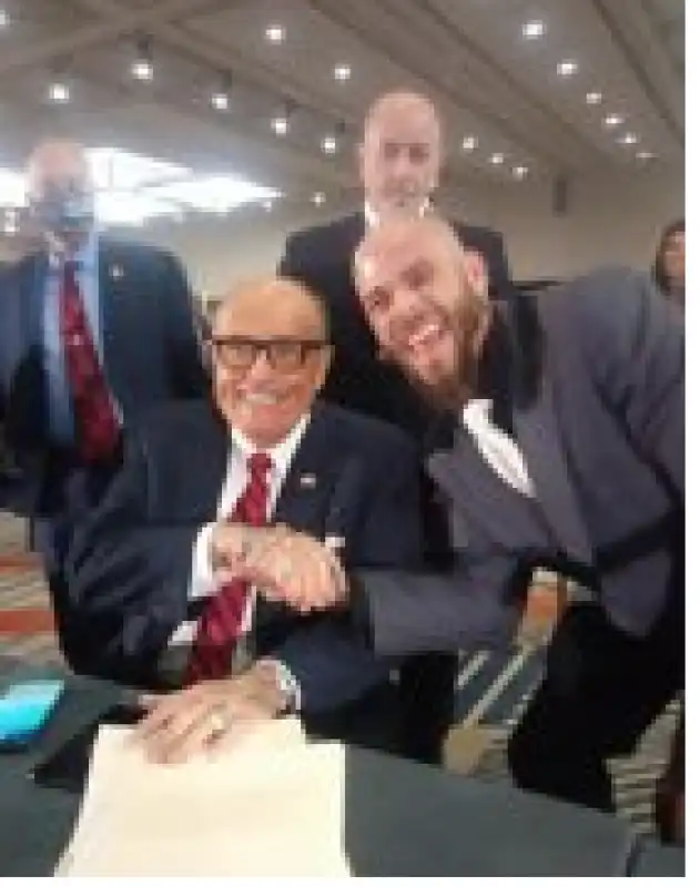 jake angeli rudy giuliani