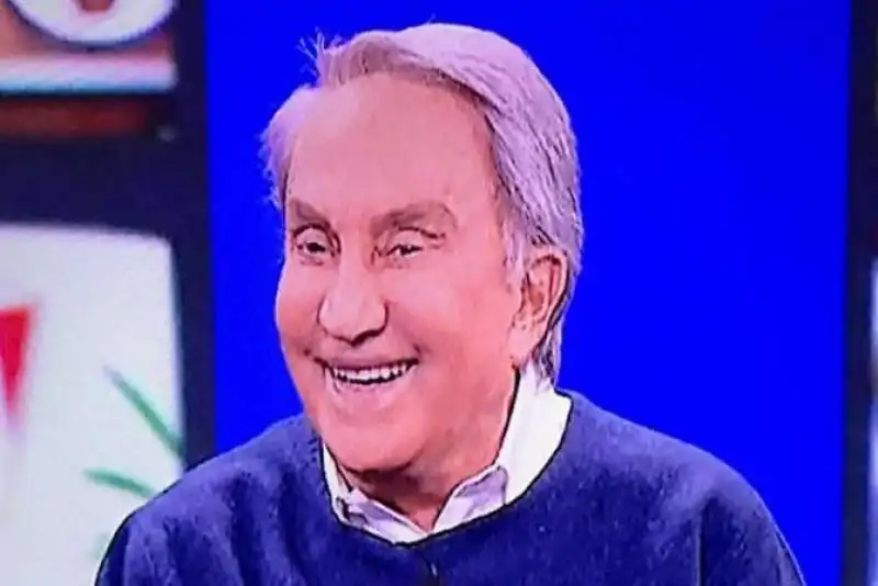 emilio fede con la faccia gonfia in tv