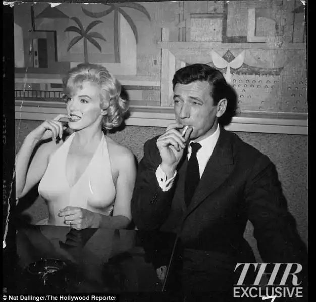 Marilyn con Ives Montand 