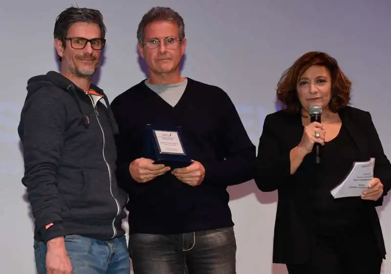 massimo e marco leopardo premiati da laura delli colli