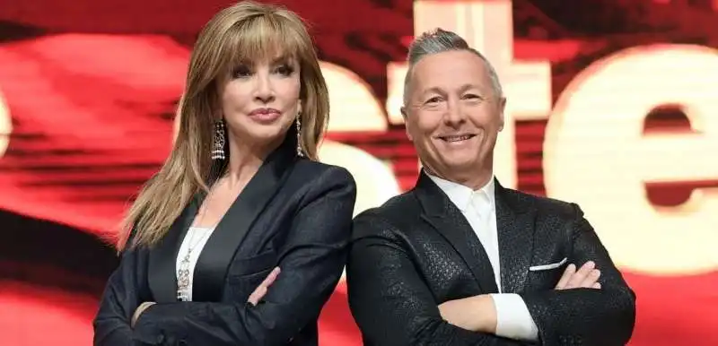 MILLY CARLUCCI PAOLO BELLI