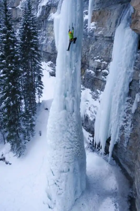 6. ice climbing a frozen waterfall