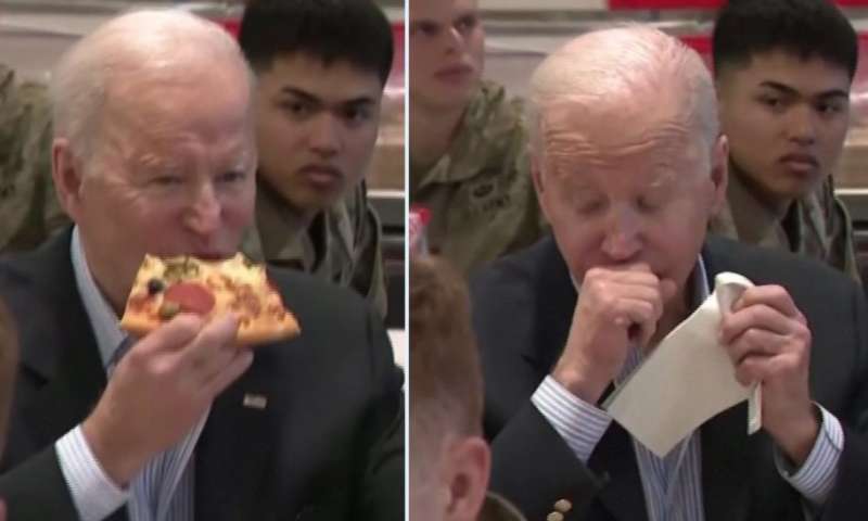 joe biden mangia la pizza con i soldati americani in polonia 7