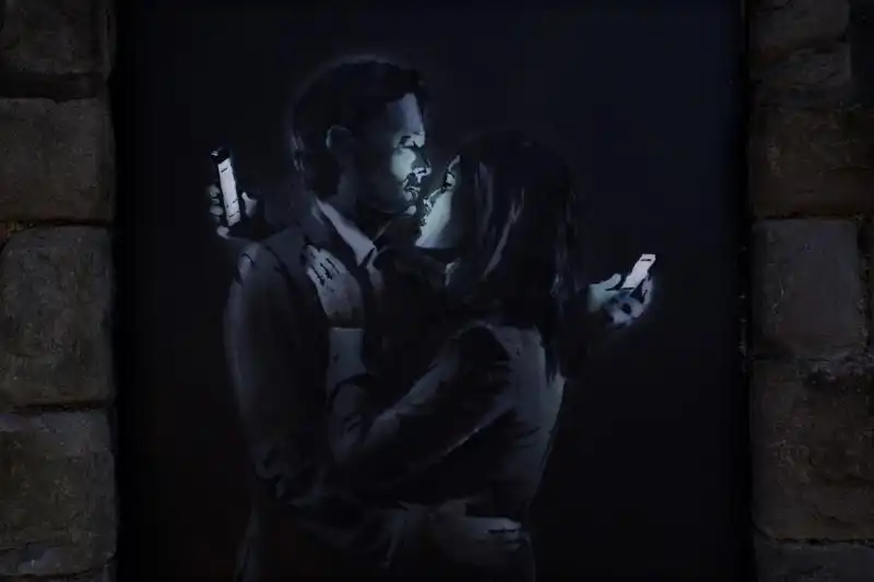 Mobile Lovers di Bansky 