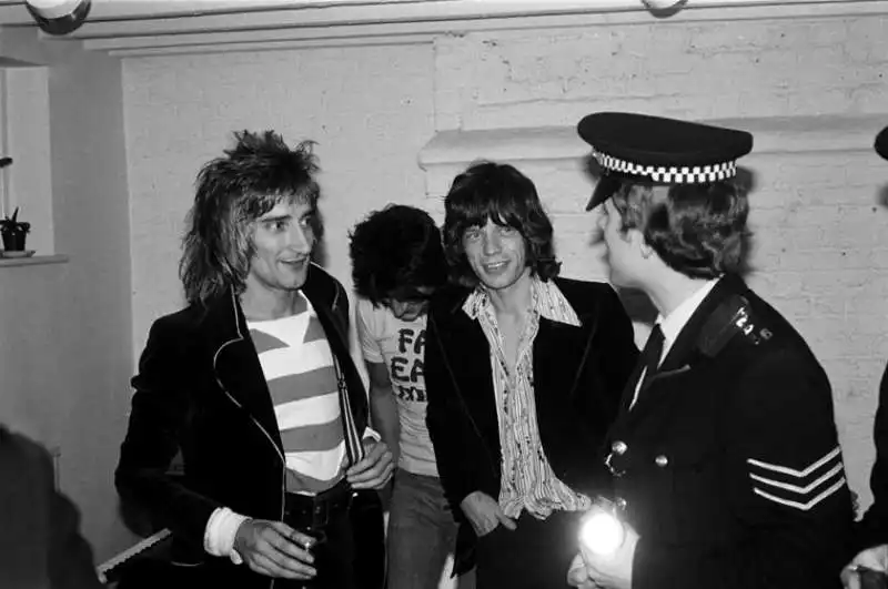 Ron Wood Rod Stewart e Mick Jagger ©MickRock jpg