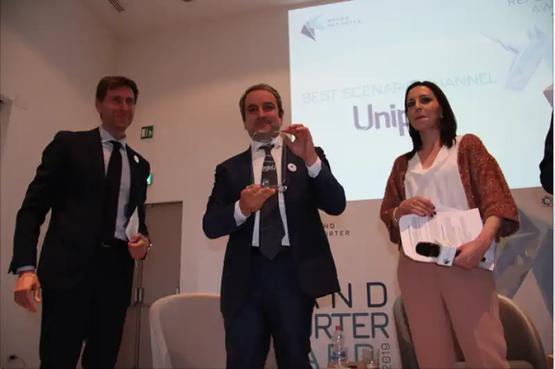 premio a unipol  diomira cennamo brl, andrea colucci brl e fernando vacarini responsabile ufficio stampa gruppo unipol