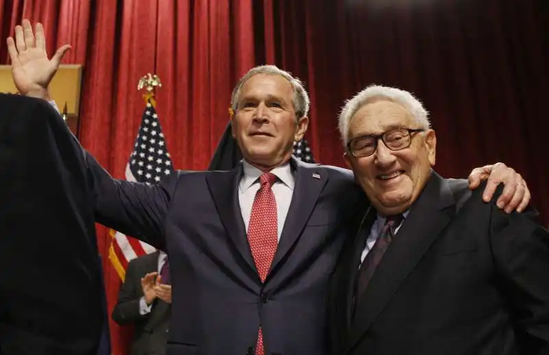 george bush jr henry kissinger