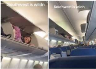donna sdraiata nel vano bagagli su un aereo negli usa 1