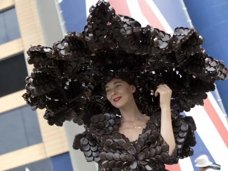 designer larisa katz wore an elaborate hat made of chocolate packaging 