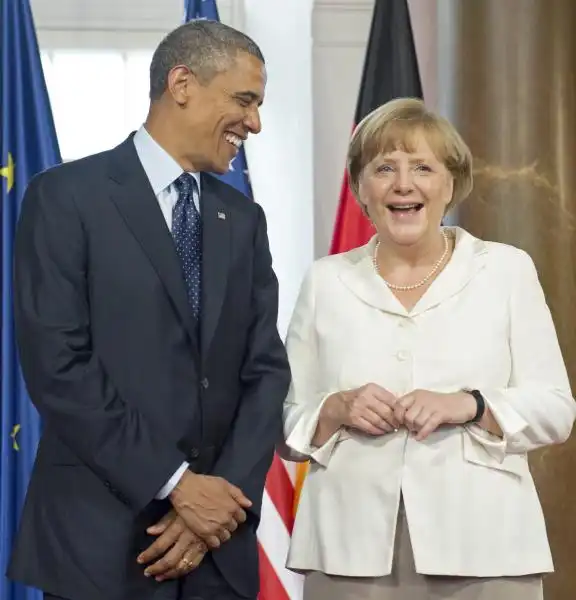 OBAMA E ANGELA MERKEL FOTO LAPRESSE 