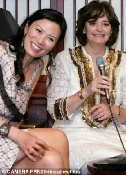 WENDI DENG E CHERIE BLAIR 