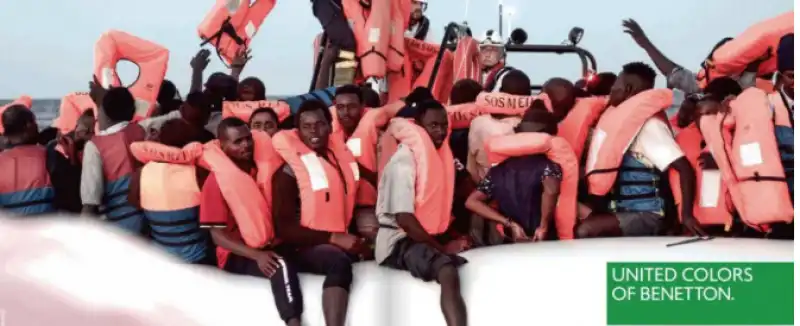 toscani foto benetton migranti