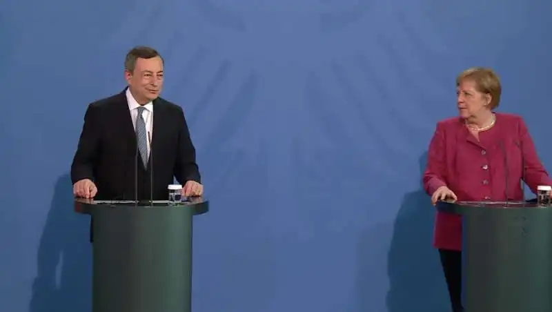 mario draghi angela merkel.   3