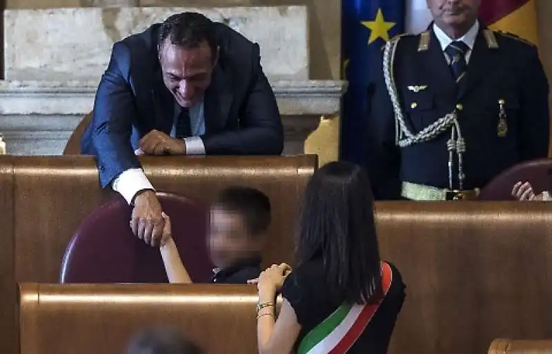 raggi col figlio e de vito