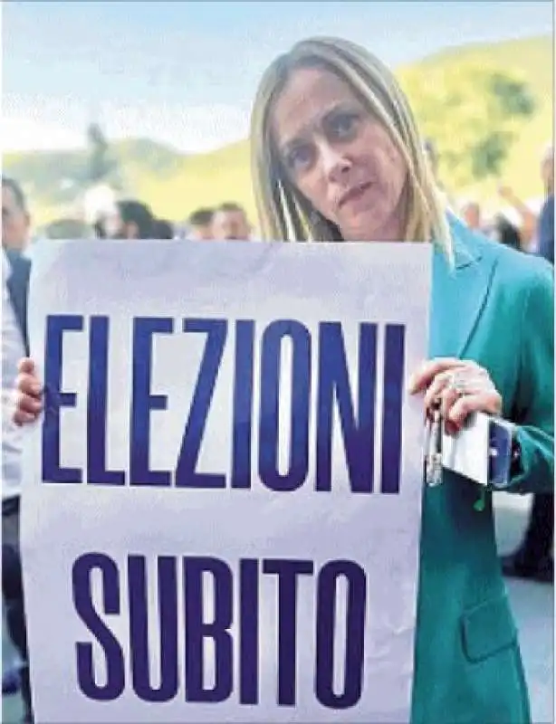 GIORGIA MELONI E IL CARTELLO ELEZIONI SUBITO