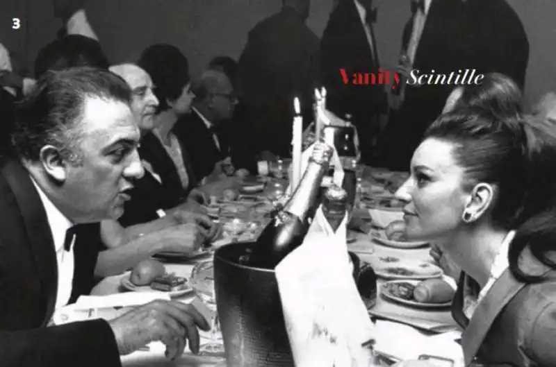 ljuba rizzoli con federico fellini a una cena del montecarlo sporting d'ete 