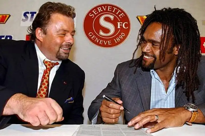 MARC ROGER E KAREMBEU 