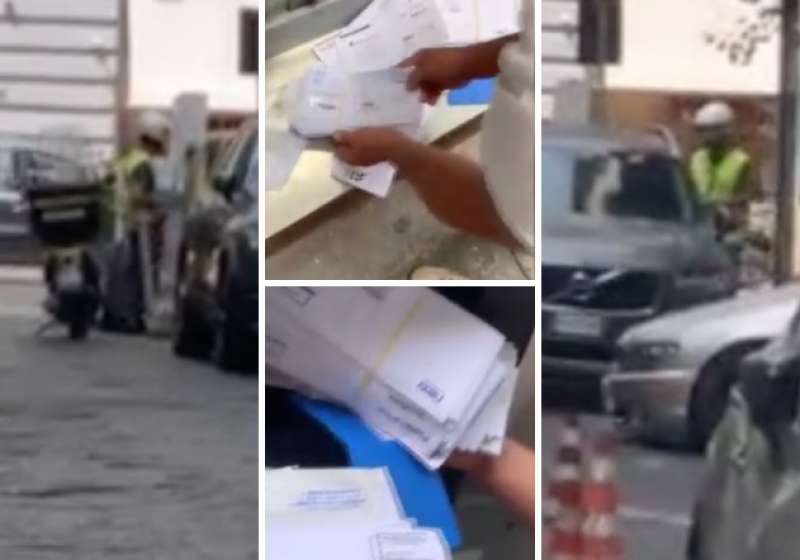 napoli, postino butta le lettere nel cassonetto.