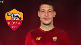 FOTOMONTAGGIO DI ANDREA BELOTTI CON LA MAGLIA DELLA ROMA