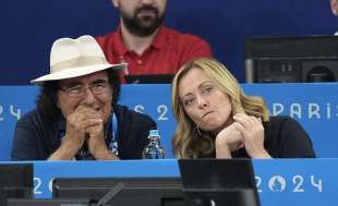 al bano con giorgia meloni parigi 2024