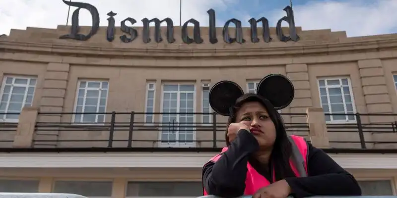 banksy is opening a dystopian themed amusement park called dismaland her...