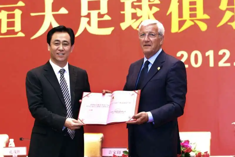 xu jiayin con marcello lippi