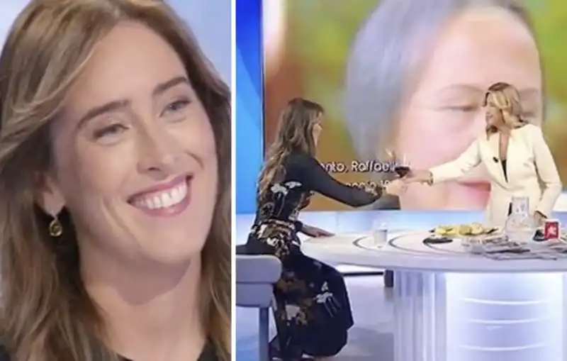 myrta merlino offre un bicchiere di vino alla boschi 8