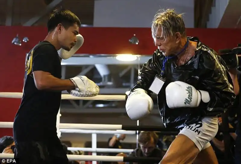 mickey rourke, 23876e8200000578 2853452 getting his speed back coach marvin somodio held up focus mitts  6 1417211420822