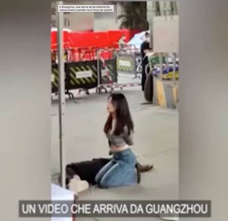 guangzhou protesta di una donna senza mascherina