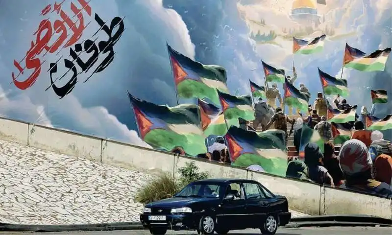 MURALE CHE INNEGGIA AGLI ATTACCHI TERRORISTICI DI HAMAS, A BEIRUT 