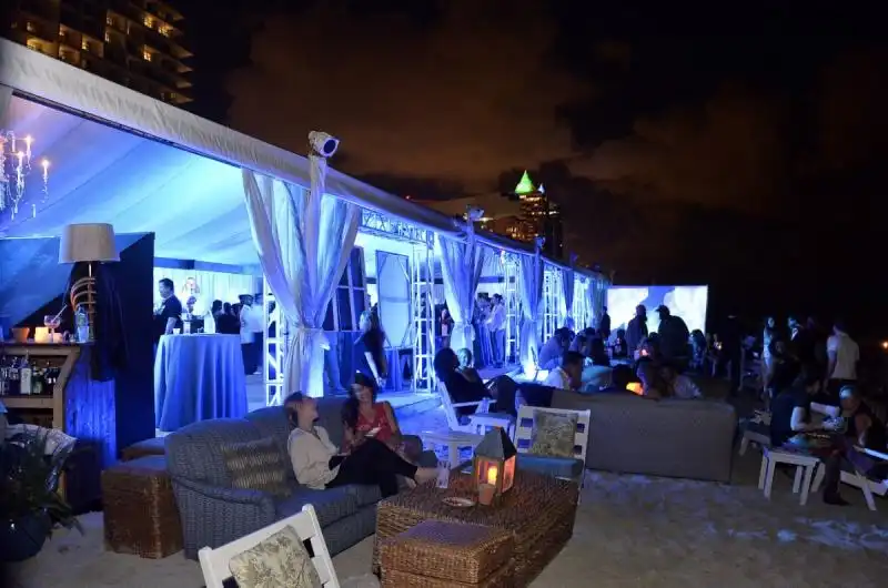 nearby the soho beach house put on the bombay sapphire artisan series finale dinner hosted by russell and danny simmons and top chefs tom colicchio  