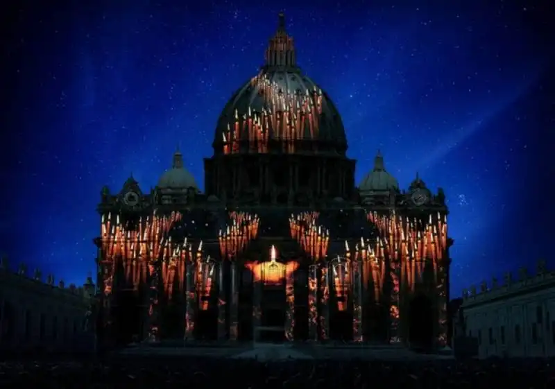 show di luci sulla facciata di san pietro