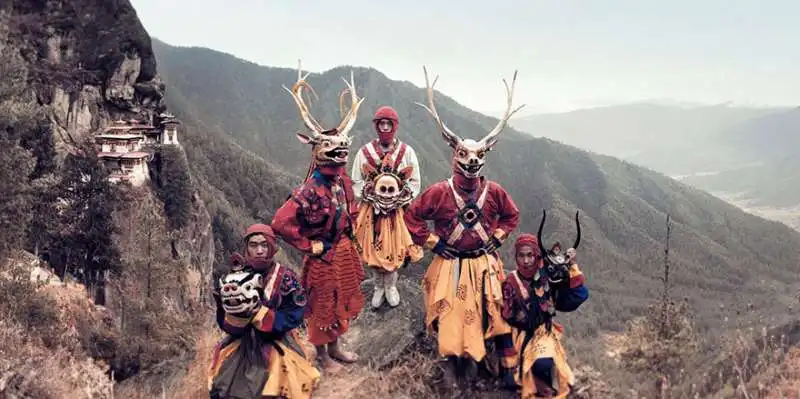 mask dancers, paro, bhutan