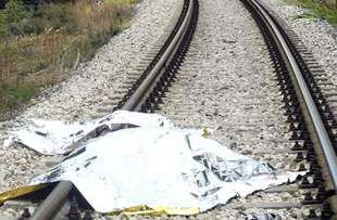 SUICIDIO SOTTO A UN TRENO