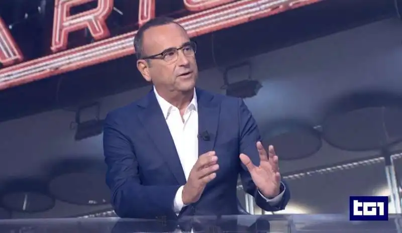 CARLO CONTI ANNUNCIA I BIG DI SANREMO AL TG1