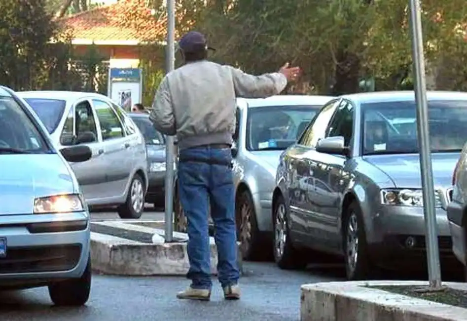 parcheggiatore abusivo