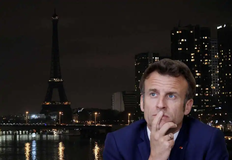 emmanuel macron luci spente torre eiffel 